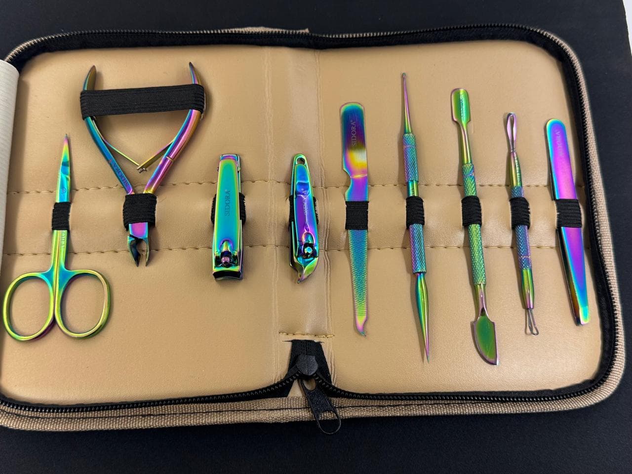 A full Ranzen manicure and pedicure implement set in a rainbow titanium finish